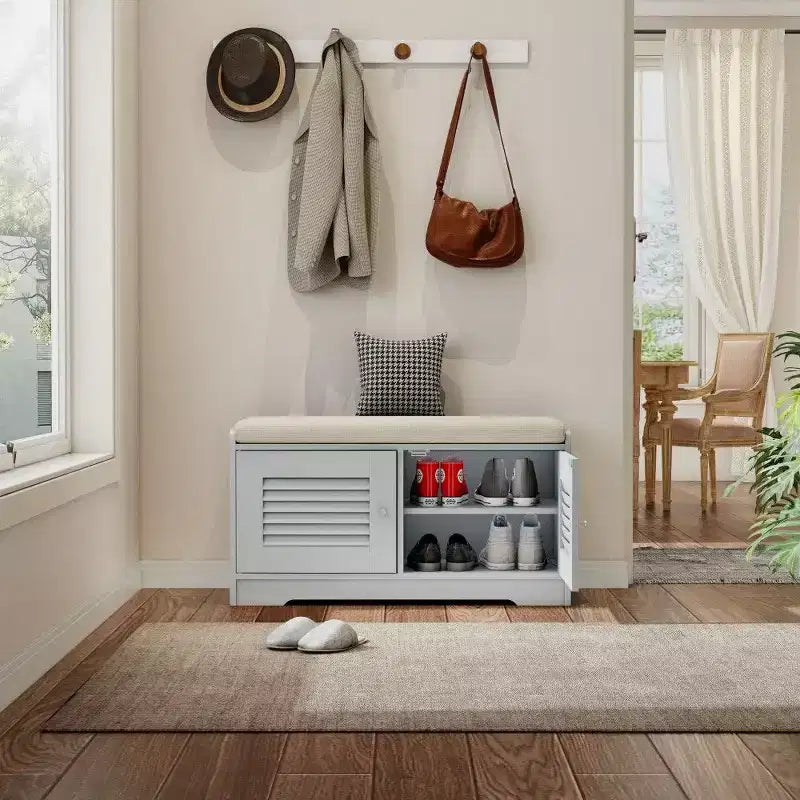 Banc meuble à chaussures avec double portes, banc d'entrée avec étagères réglables et coussins amovibles, étagère à chaussures de couloir.