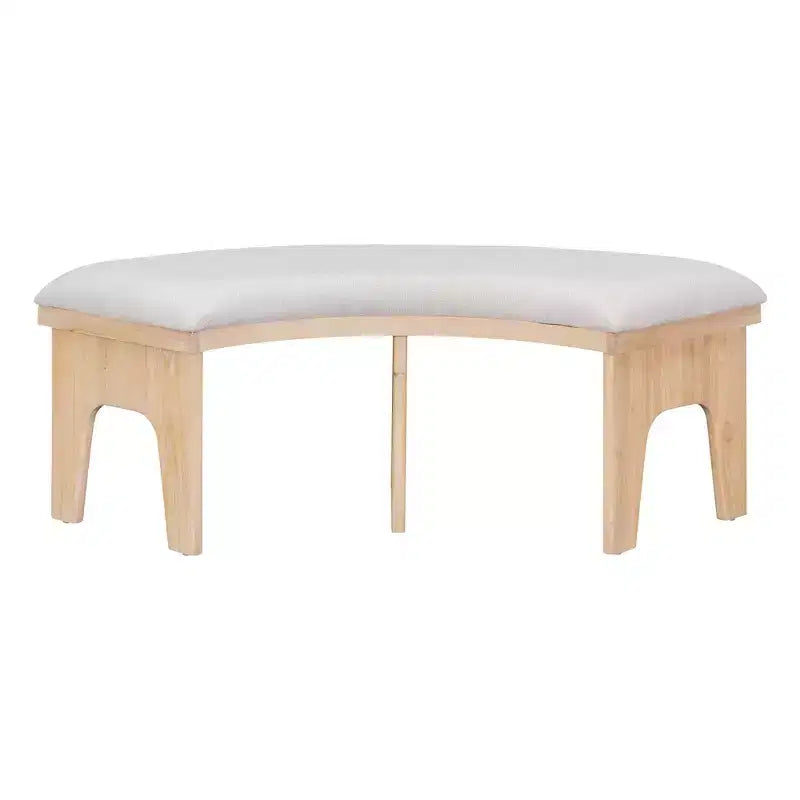 Ensemble table et chaises de salle à manger rondes de style campagnard, comprenant des chaises rembourrées et un banc incurvé.