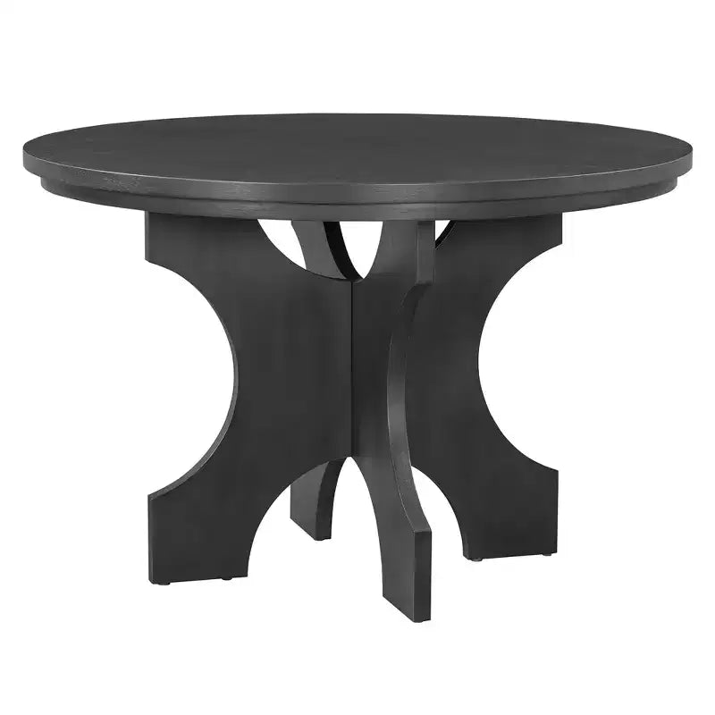 Ensemble table et chaises de salle à manger rondes de style campagnard, comprenant des chaises rembourrées et un banc incurvé.